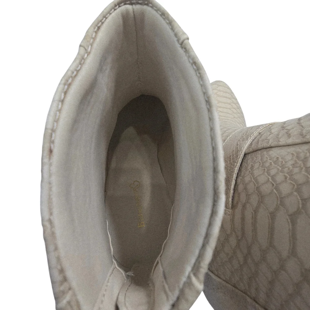 Beige snake-patterned Baretraps Lucia booties feature a stacked heel
